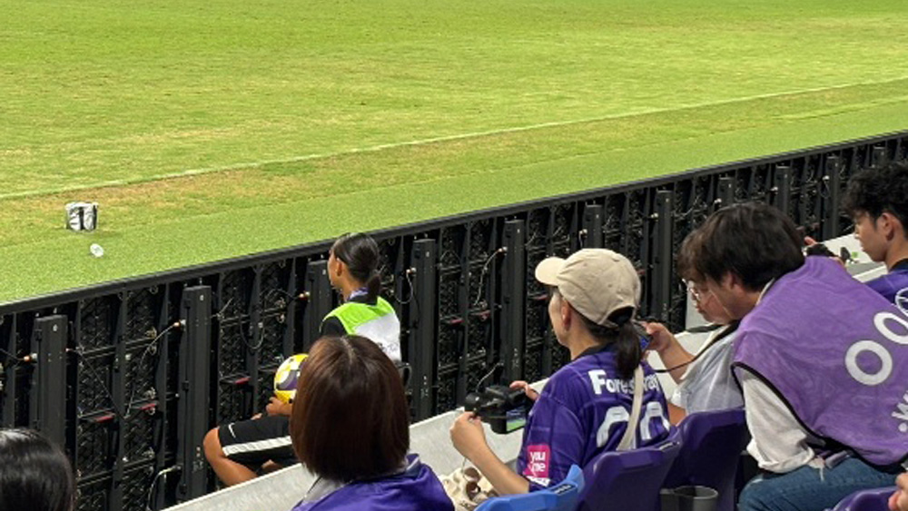 試合中:西田氏のアドバイスを受けながらプレイヤーズアイシートで撮影